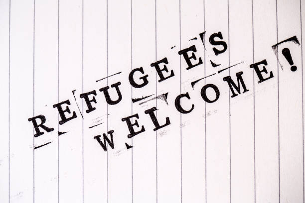 istock refugees welcome text on paper 640222682