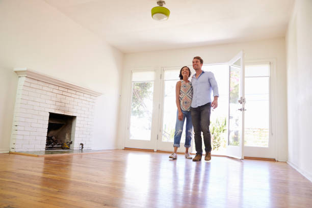 istock Excited Couple Explore New Home On Moving Day 640228148