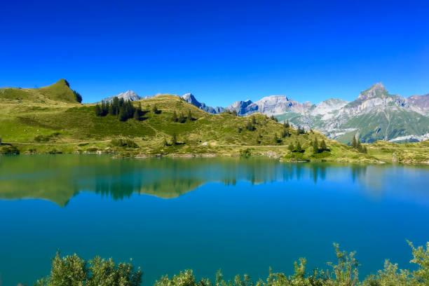 Beautiful mountain landscape at Trübsee lake in Engelberg Switzerland on a beautiful summer day.