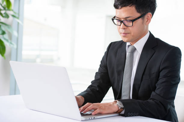 istock Businessman who works on a laptop computer 640228874