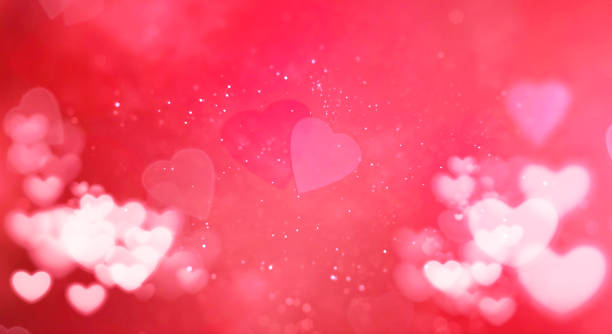 istock red and white bokeh heart on pink hearts shape background 640229622