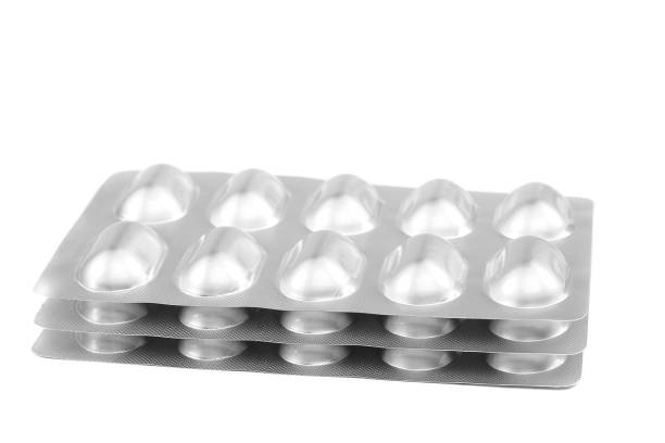 istock Pills in blister packs on white background. 640231498