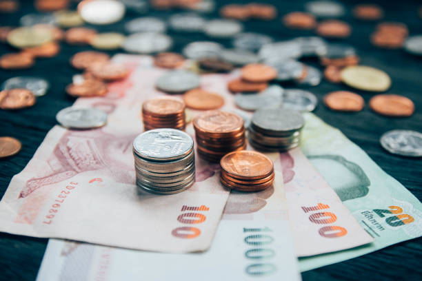 istock Thai Baht Coins and money background 640231552