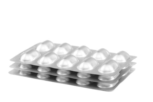 istock Pills in blister packs on white background. 640231584