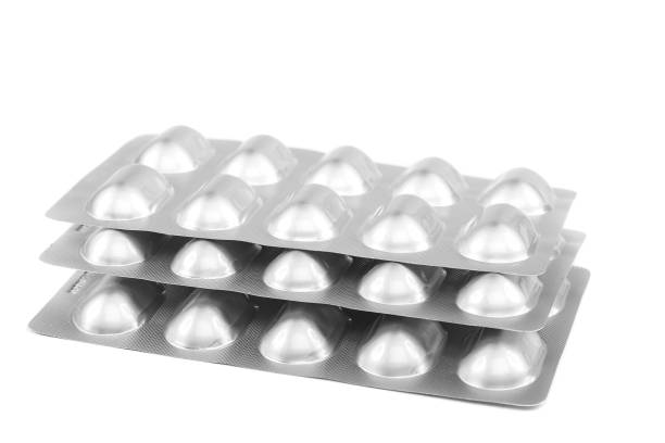 istock Pills in blister packs on white background. 640231638