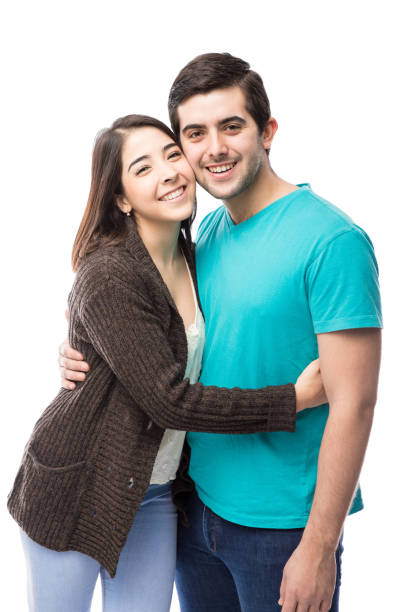istock Cute young Hispanic couple dating 640234486