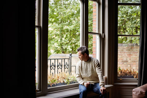 istock Contemplating the day over coffee 640235824