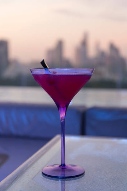 istock Red martini with cityscape background 640236466