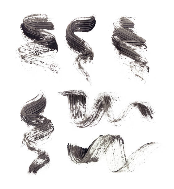 Collection of smears of black mascara Collection of smears of black mascara on isolated white background woman mascara smudged stock pictures, royalty-free photos & images