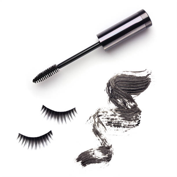 Set with mascara, strokes and false lashes Set with mascara, strokes and false lashes isolated on white background woman mascara smudged stock pictures, royalty-free photos & images