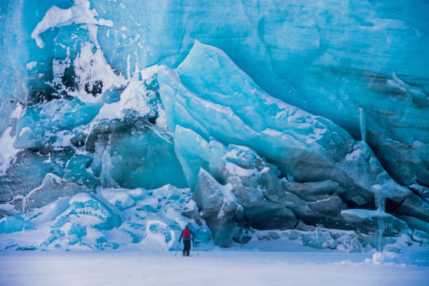 Ski touring past an ancient glacial formation in the backcountry
