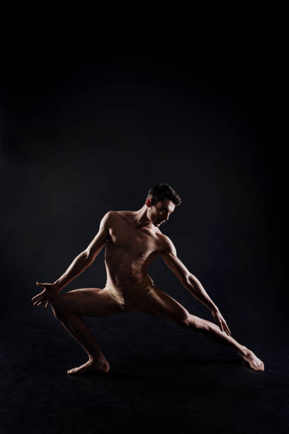 istock Flexible athlete stretching in the studio 640243034