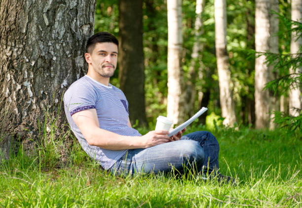 istock Young man in city park 640246032