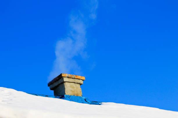 istock Smoke from a chimney on winter 640246180