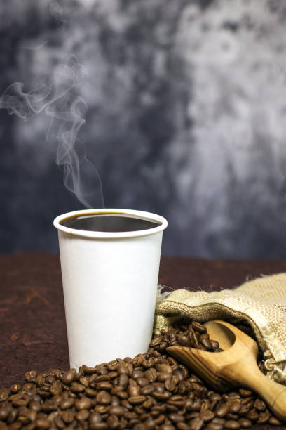 istock Hot coffee black coffee with beans 640248344