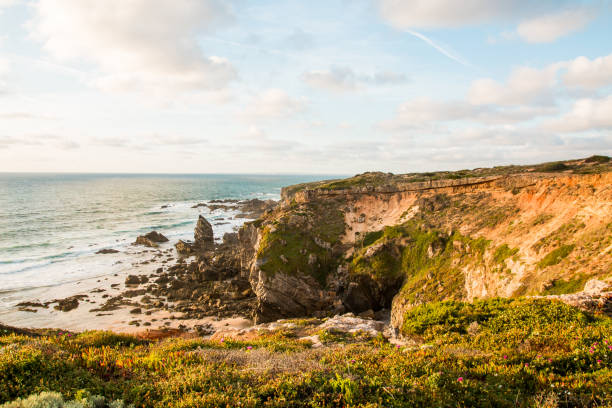 istock Empty beach and cliff tops on Praia de Marinha 640249486