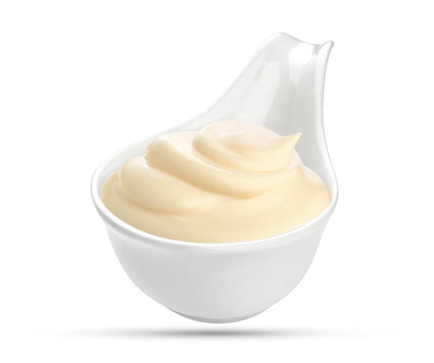 istock Mayonnaise sauce in bowl isolated on white 640251848