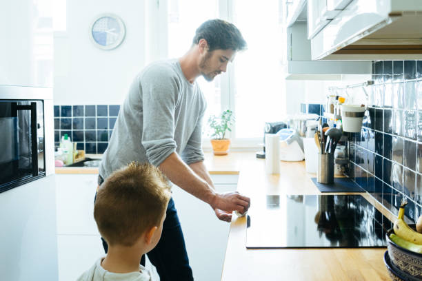 istock Father Cleaning Up The Kitchen After Breakfast 640252070