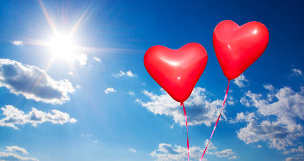 istock Two Red Hearts in the sky 640252498