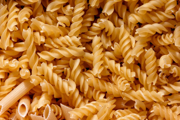 istock Italian spiral pasta close up 640256186