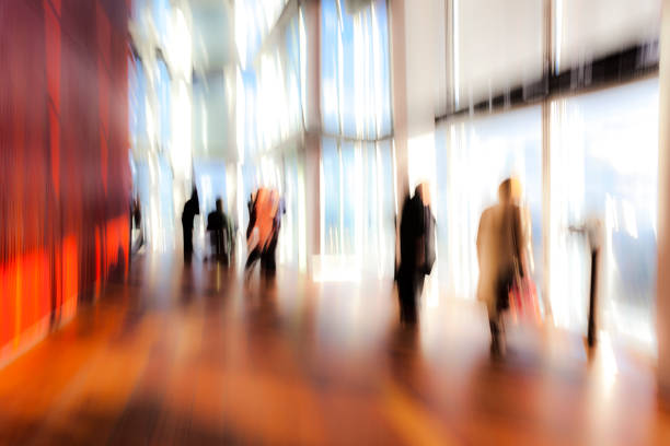 istock Abstract Silhouettes of Standing People in Modern Interior 640257820
