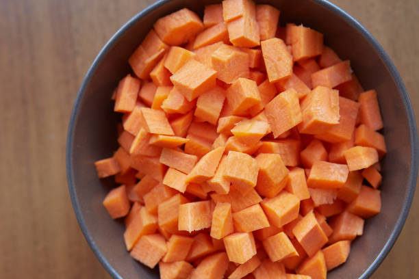 istock Sliced carrots in a brown plate. 640258290