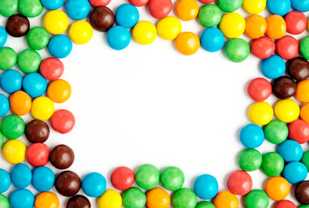 istock Colorful chocolate candies frame 640259734