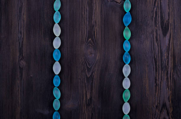 dark wooden texture background decorated with glass balls