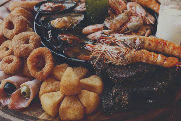 istock Seafood platter on wooden table background 640263664