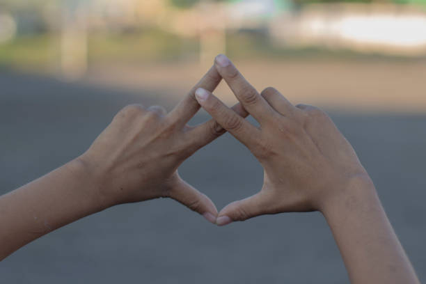 istock hand sign in natural 640265166