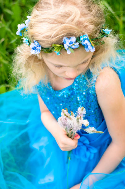 istock girl with flowers 640265802