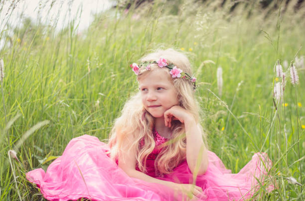 istock cute blond princess girl 640266010