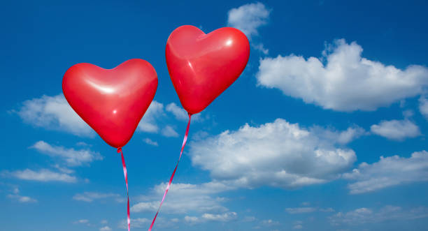 istock Two Red Hearts in the sky 640266210