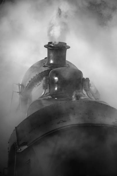 istock Restored Victorian era steam train engine with full steam 640266462