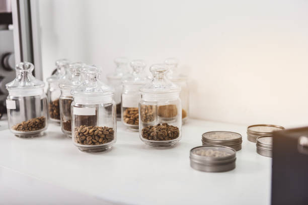 Roasted coffee beans in the glass bottle container
