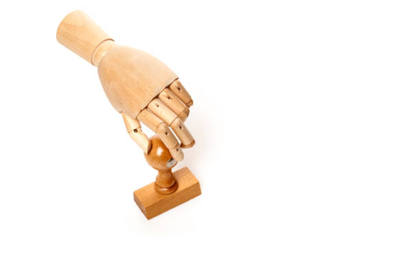 istock Wooden  hand and stamp 640268584
