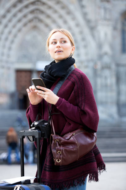 istock Girl uses gps on your mobile phone 640268930