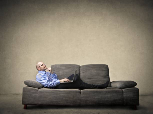 istock Businessman on the couch 640273196