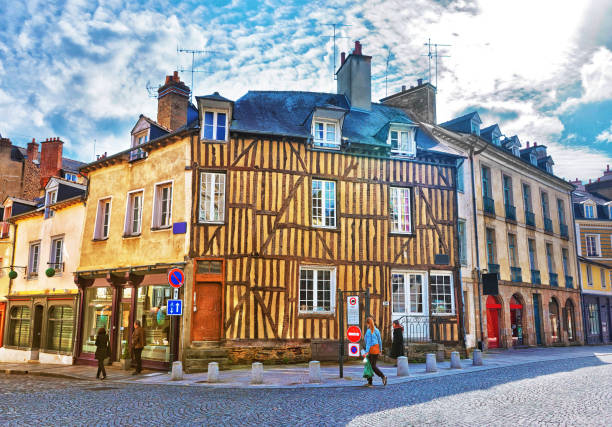 Half timbered houses in Rennes of Brittany France Rennes, France - May 7, 2012: Old half-timbered houses in the old city center of Rennes, Brittany region, France. People on the background. rennes france photos stock pictures, royalty-free photos & images