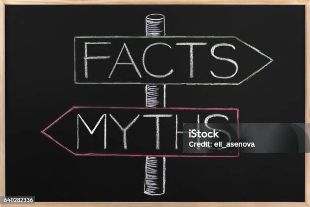 Choicе Myths Or Facts Wrriten On Opposite Arrows On Blackboard Stock Photo - Download Image Now