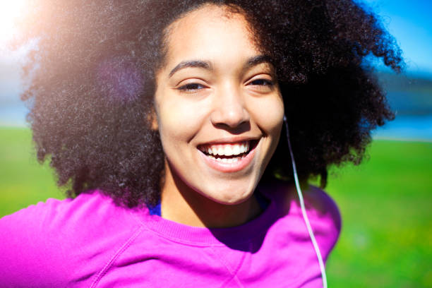 istock Woman relaxing from exercising in nature, wearing smart technology 640285370