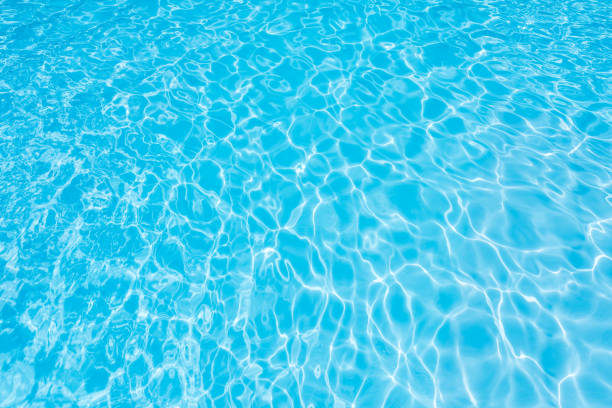 istock Ripple Water in swimming pool with sun reflection 640286688