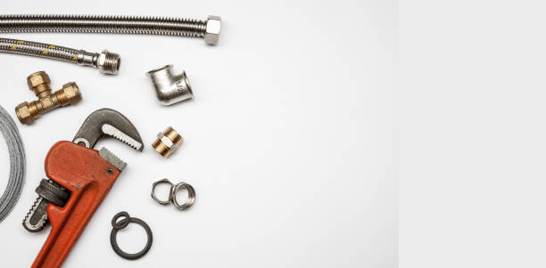 istock plumbing tools and equipment on white background with copy space 640292796