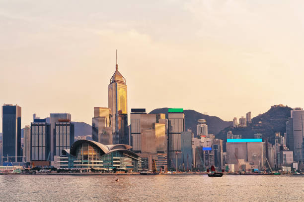 istock Small Junk at Victoria Harbor in Hong Kong 640293426