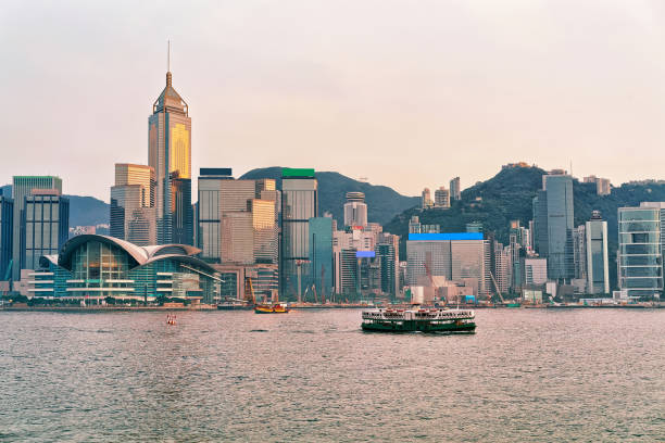 istock Star ferry in Victoria Harbor in HK at sundown 640294792