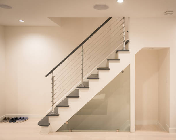 Modern staircase hand rail design Modern staircase and hand rail design in white and grey color recessed light stock pictures, royalty-free photos & images