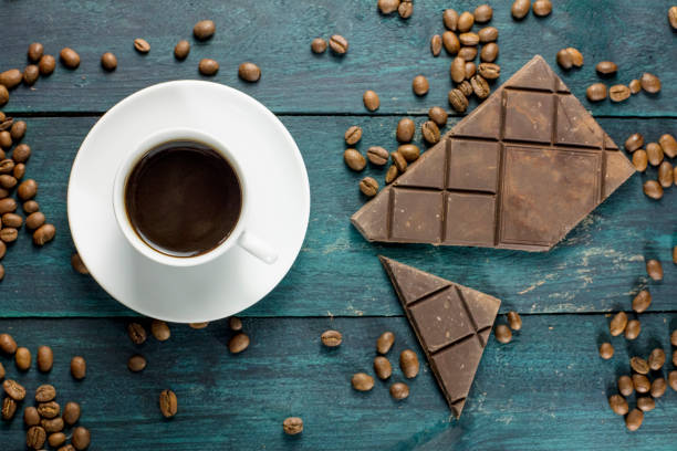 istock Coffee cup photo with grains and chocolate 640296198