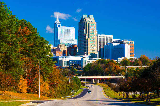 istock Raleigh Skyline in the distance with autumn colored trees 640296786