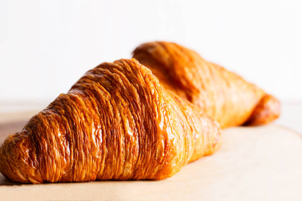 istock two crunchy croissants 640297478