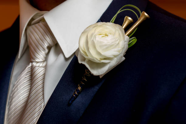 istock Man Wearing A Golf Tee Rose Boutonniere 640297750